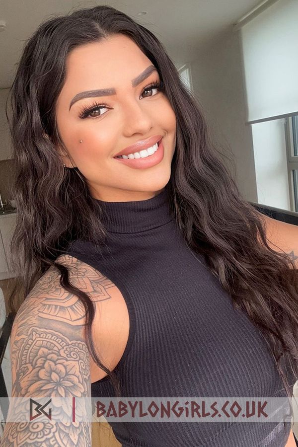 Striking Bravo brunette 5ft 5, 34C
